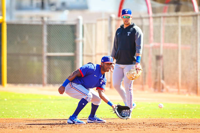 Photo of Khris Davis & Nate Lowe by Kelly Gavin / Courtesy of the Texas Rangers